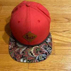 I am selling a black and red snapback multiple colors on the rim original